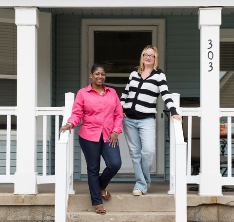 Women in front of home